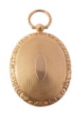 A late Victorian gold hinged locket