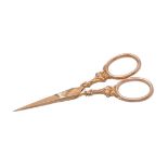 A late Victorian 9 carat gold and gilt steel sewing scissors probably by Horton & Allday