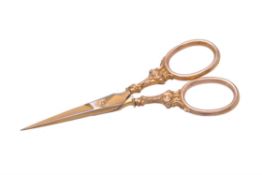 A late Victorian 9 carat gold and gilt steel sewing scissors probably by Horton & Allday