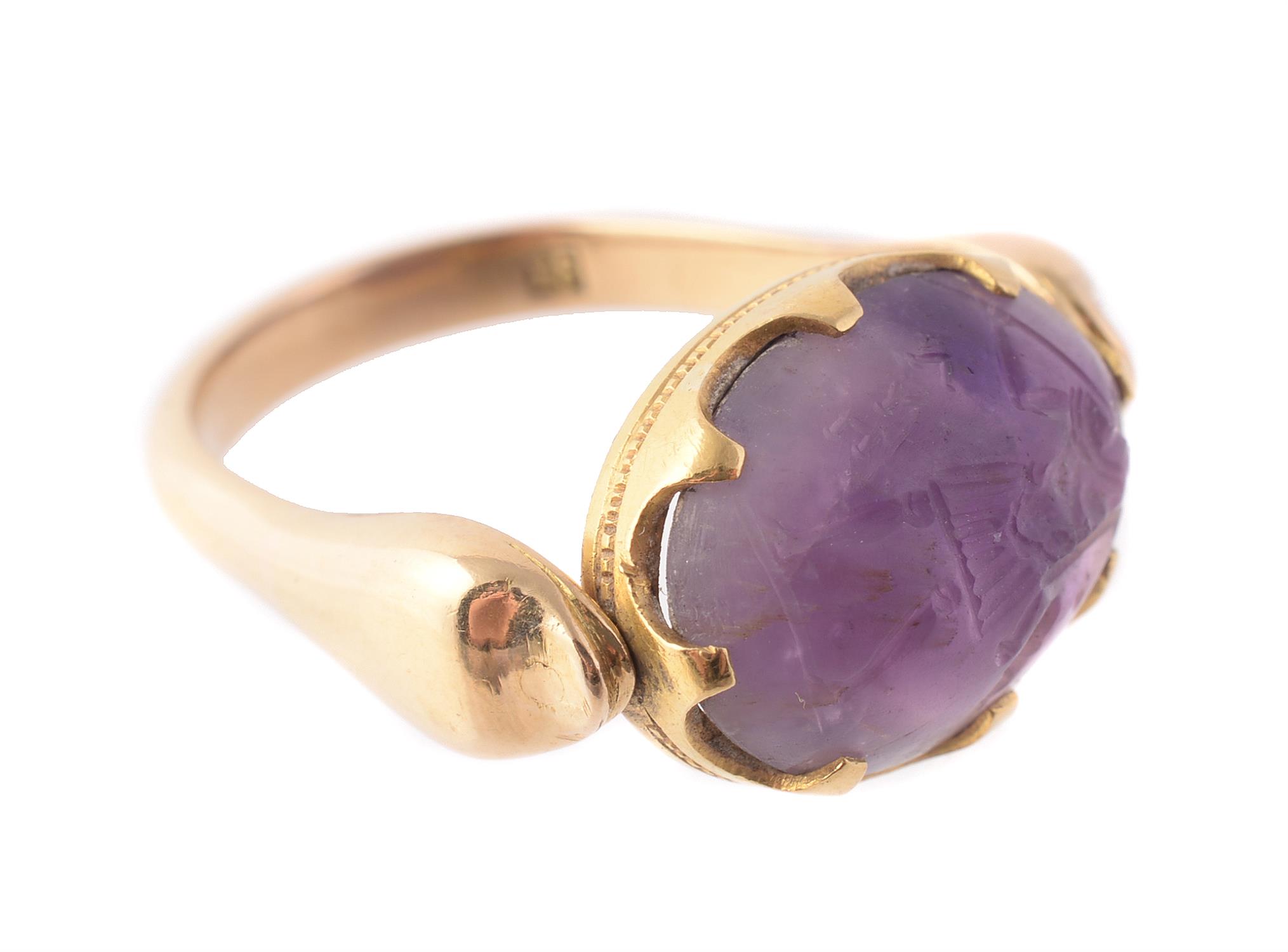 A late Victorian amethyst intaglio swivel ring