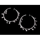 A pair of diamond hoop ear pendants by Elie Chatila