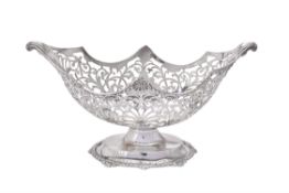 An Edwardian silver shaped oval pierced bowl by Josiah Williams & Co.