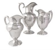 Three American silver water pitchers or jugs