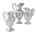 Three American silver water pitchers or jugs
