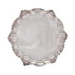 A late Victorian silver shaped circular salver by Edward Barnard & Sons Ltd.