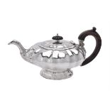 A George IV silver melon shaped tea pot by Charles Fox I