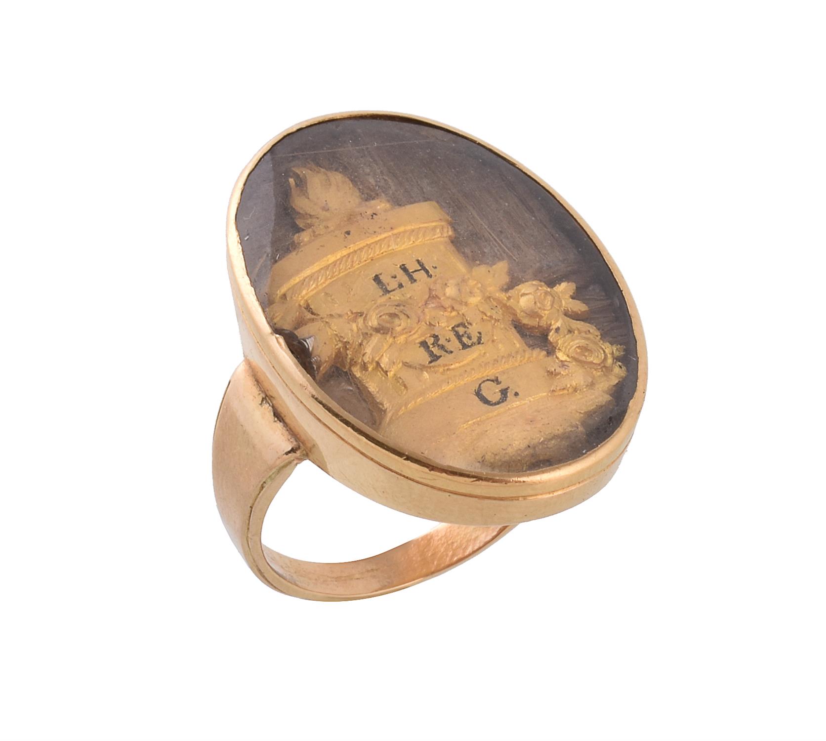 A Georgian gold and hair work sentimental ring