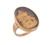 A Georgian gold and hair work sentimental ring