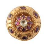 A mid Victorian gold, garnet and chrysoberyl brooch