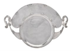 A Middle Eastern silver coloured twin handled tray