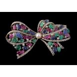 A multi gem set bow brooch