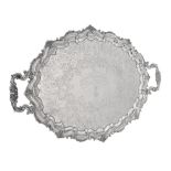 An Edwardian silver twin handled shaped oval tray by Barker Brothers