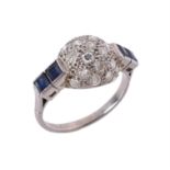 A 1960s diamond and sapphire bombé dress ring