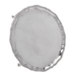 A silver shaped circular salver by Edward Barnard & Sons Ltd.