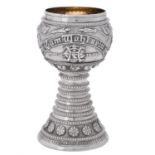 A Victorian silver chased goblet by Dobson & Sons