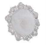 An Edwardian silver shaped circular salver by Barker Brothers