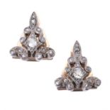 A pair of Continental diamond clip brooches