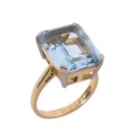 A 1970s 18 carat gold single stone aquamarine ring