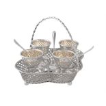 A Victorian silver quatrefoil four cup egg stand by Henry Wilkinson & Co.