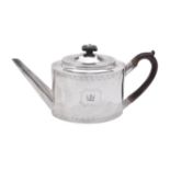 A George III silver oval tea pot by John Robins