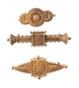 A mid Victorian gold Etruscan Revival brooch