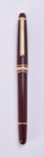 Montblanc, Meisterstuck, a burgundy fountain pen - LOT WITHDRAWN