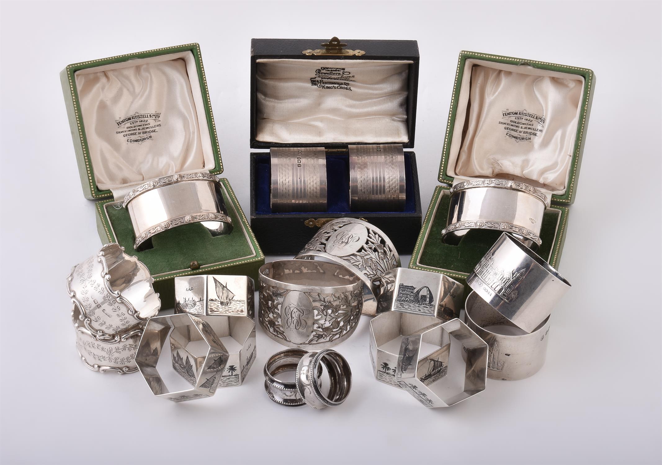 A collection of silver napkin rings