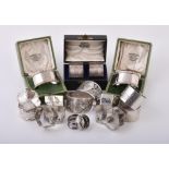 A collection of silver napkin rings