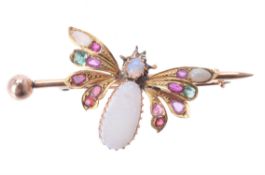 A gem set butterfly brooch