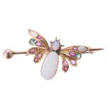 A gem set butterfly brooch