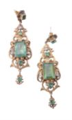 A pair of pre 1950 Continental emerald and half pearl earrings