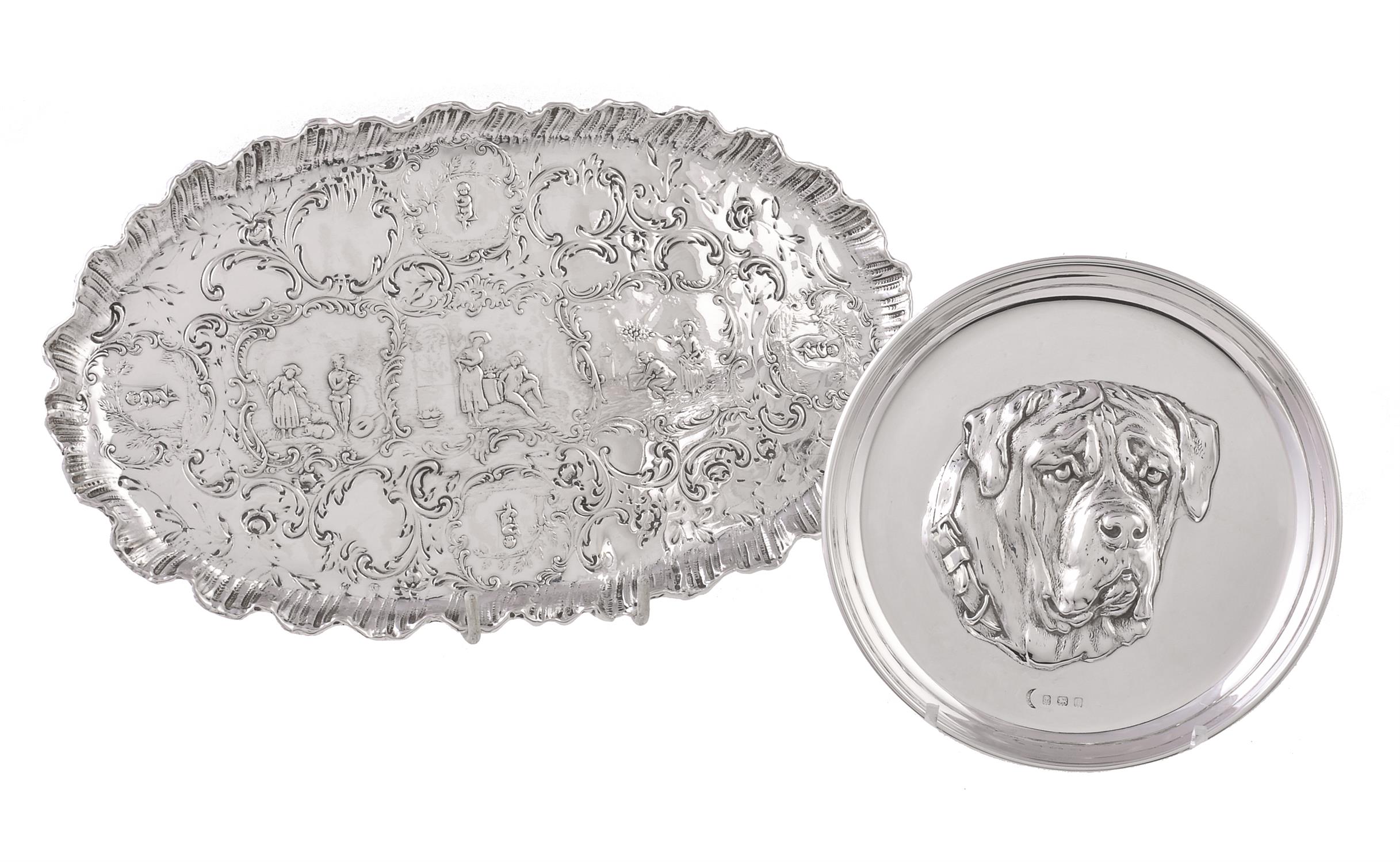 A German silver shaped oval dressing table tray