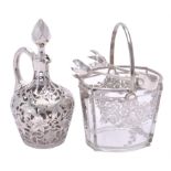 A silver encased clear glass liqueur decanter and stopper by The English Pure Silver Co.