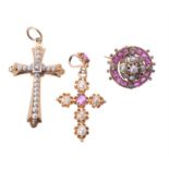 An early 20th century ruby and half pearl cross pendant