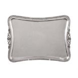 A Continental silver shaped rectangular dressing table tray