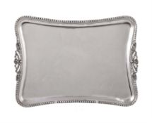 A Continental silver shaped rectangular dressing table tray