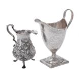 A George III silver helmet shaped cream jug