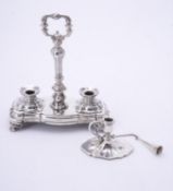 A Victorian silver shaped oval chamberstick and snuffer by Henry Wilkinson & Co.