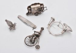 A collection of silver and silver coloured items