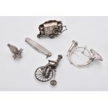 A collection of silver and silver coloured items