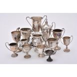 A collection of silver trophy cups