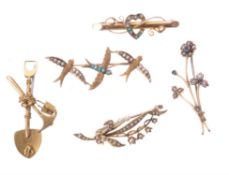 A small collection of antique brooches