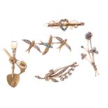 A small collection of antique brooches