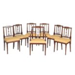 Y A set of seven mahogany dining chairs