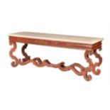 An Italian red painted and parcel gilt console table