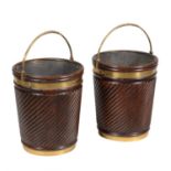 A pair of mahogany and brass bound peat buckets in George III Irish style