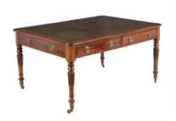 A Regency mahogany and leather inset library table