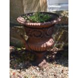 A Victorian cast iron 'Medici style' campana garden urn