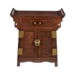 A Chinese hardwood scroll cabinet