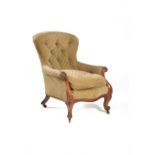 A Victorian walnut and button upholstered armchair